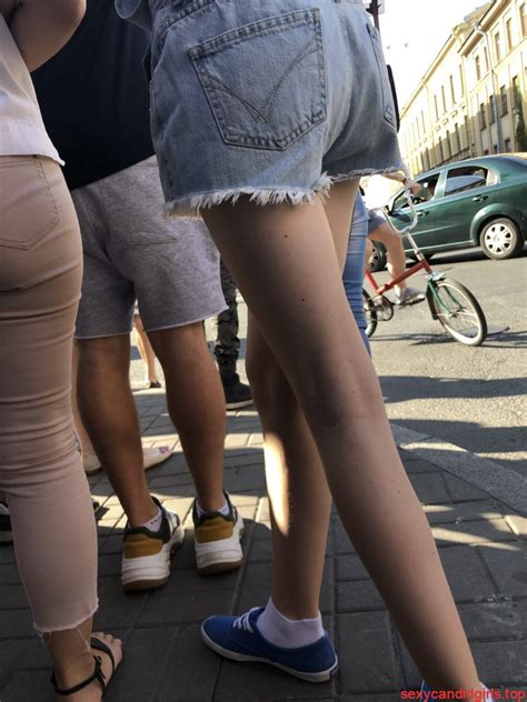 skinny legs in denim shorts city street candid pics sexy