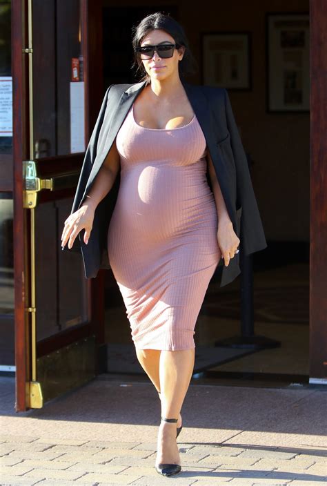 kim kardashian wears a pink dress in malibu