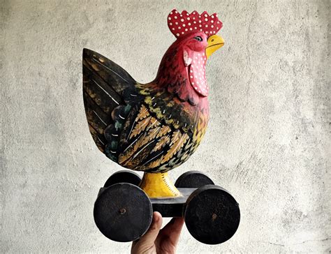 wooden rooster statue  wheels chicken folk art primitive decor