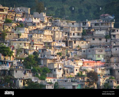 living area   large number  simple houses   hilly area developed slum haiti