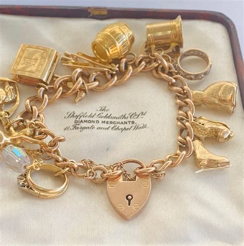 superb heavy vintage ct gold charm bracelet   gold charms fully hallmarked