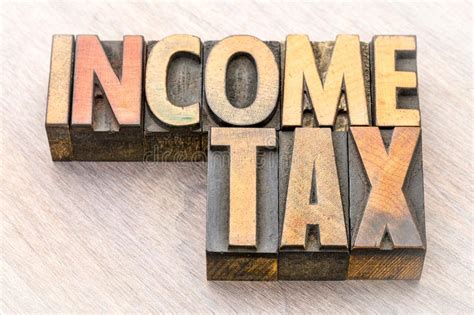 income tax word abstract  wood type stock image image