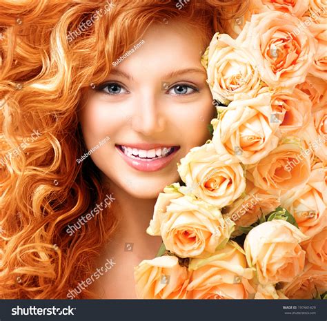 Beauty Model Girl With Long Curly Red Hair And Beautiful