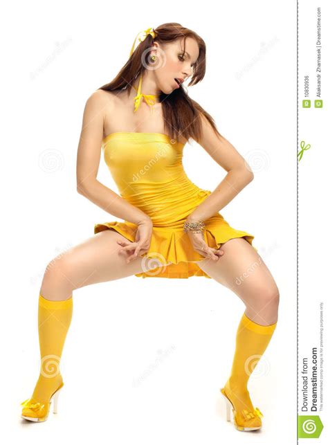 sex girl in a yellow dress royalty free stock image