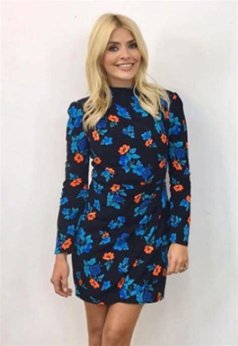 holly willoughby lifts skirt in cheeky flash video daily star