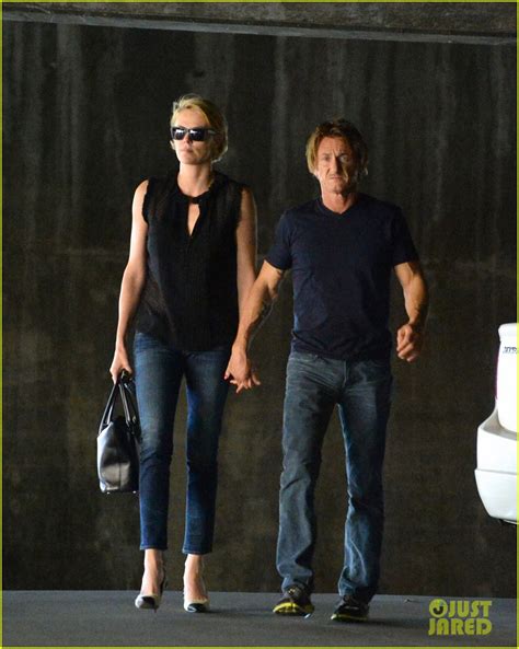 charlize theron and sean penn get affectionate hold hands