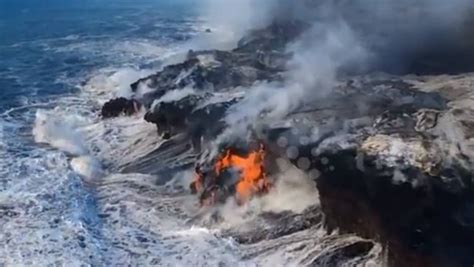 kilauea volcano hawaii drone captures  moment lava reaches  ocean stuffconz