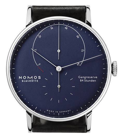 nomos lux and nomos lambda gold watch lines enhanced with beautiful colors and smaller cases