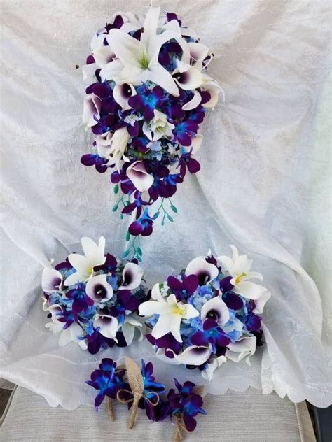 cascading bridal bouquet galaxy orchids lilies picasso etsy in 2020