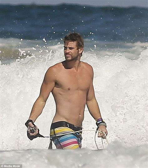 Liam Hemsworth Takes His Board To The Waves In Sydney During A Needed