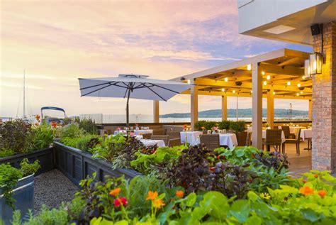 traverse city waterfront hotel kicks  season  great outdoor dining