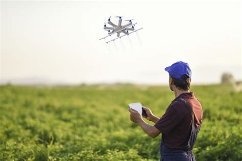 farmer spraying  crops   drone green groundswell