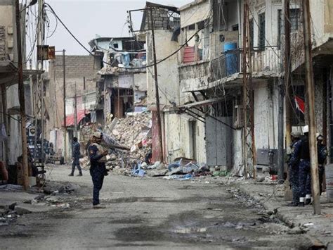 isis kills dozens of civilians caught attempting to flee mosul and hangs bodies up on