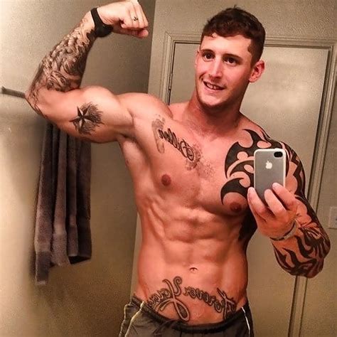 hot guy with tattoos flexing 2 pics xhamster