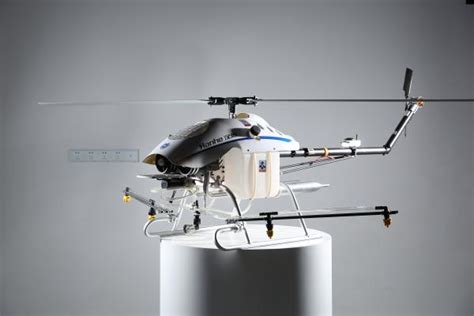 gasoline powered unmanned flybarless helicopter uav  precision agriculture   nozzles
