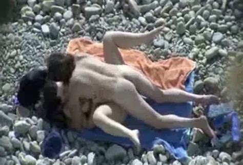 Naughty White Milf Rides Her Partner On The Nude Beach
