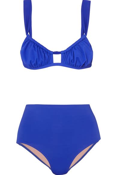 Demi Rose Flaunts Her Derriere In Bright Blue Thong Bikini