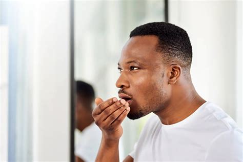 bad breath causes symptoms and treatments