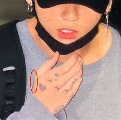why jungkook may not be fully showing his tattoos and s