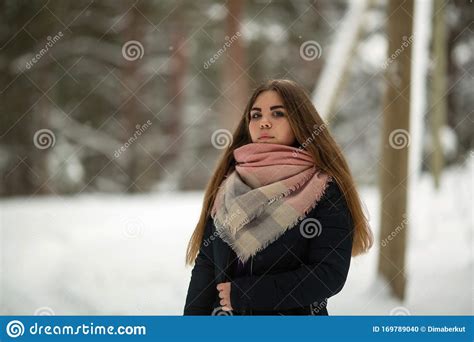 portrait of a teen russian girl outdoors in the village at