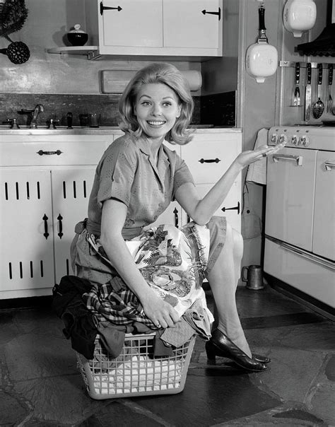 1960s smiling housewife in kitchen photograph by vintage images fine