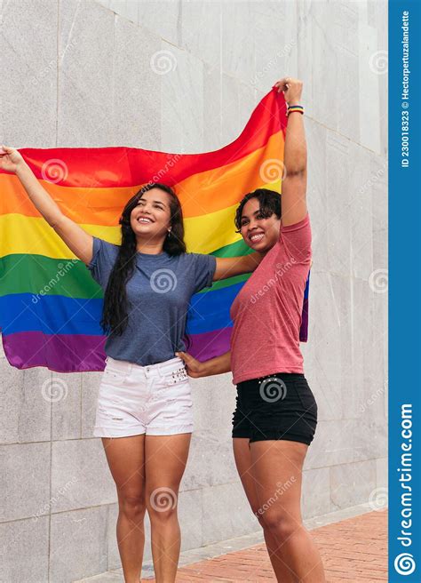 Excited Lesbian Couple Enjoys Each Other`s Company While Celebrating