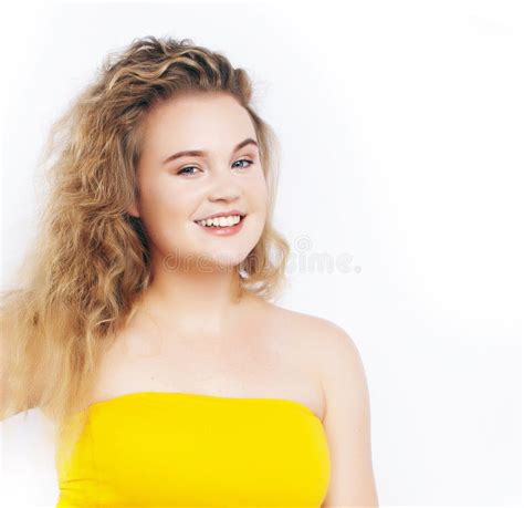 Oung Pretty Blond Girl Posing Happy Smiling On White Background