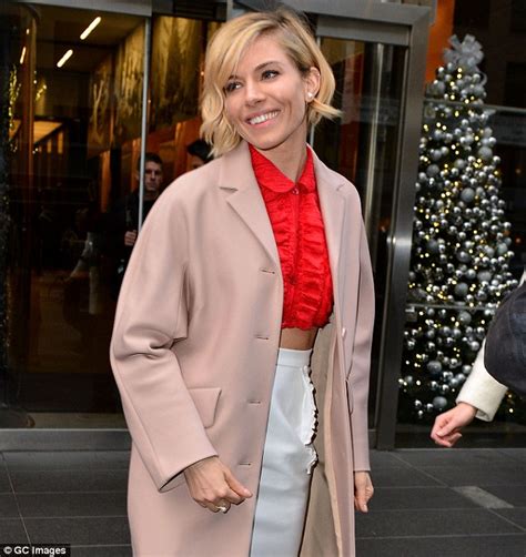 sienna miller is a fashion hit in ab flashing red crop top daily mail