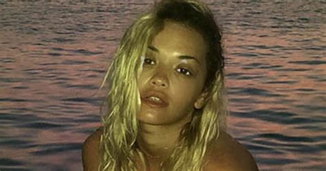 Rita Ora Strips 100 Naked On Beach – Proving Tan Lines Are The New