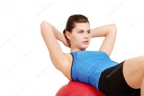 woman  situps  exercise ball stock photo  mcgphoto