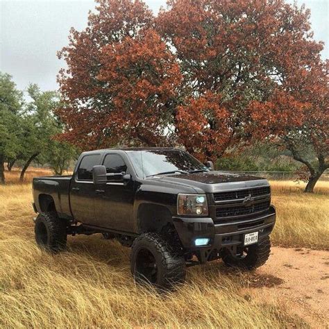awesome  lifted blacked  chevy trucks pinterest