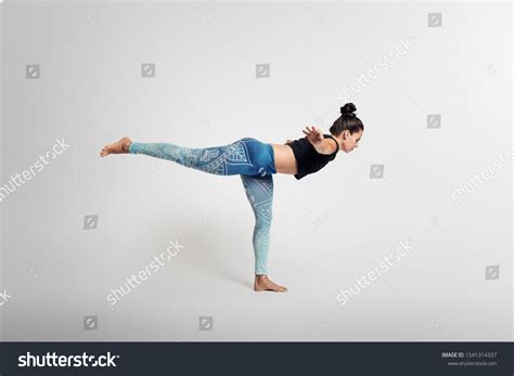 warrior  flying warrior yoga pose stock photo