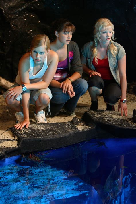 image mermaids looking into moon pool h2o just add