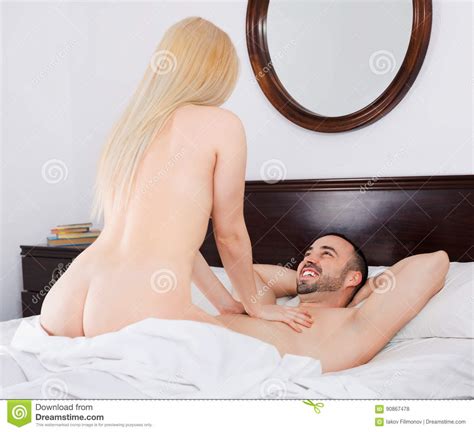Pretty Beautiful Happy Couple Having Sex In Bed Stock