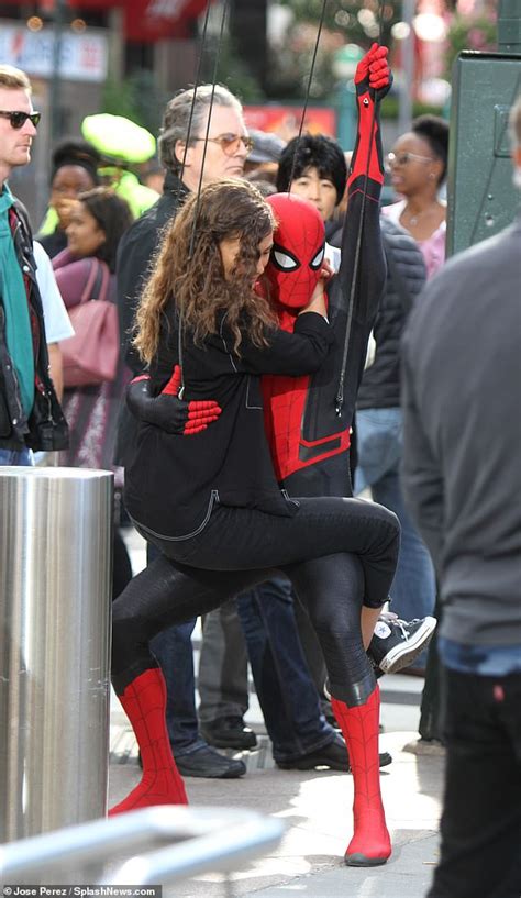 Tom Holland Swings Into Action With Zendaya In His Arms On