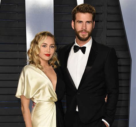 dlisted miley cyrus says she and liam hemsworth have