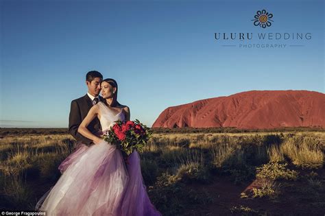 couples are heading to uluru for the wedding photo shoot of a lifetime