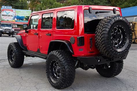 custom  jeep wrangler rubicon unlimited firecracker red aev