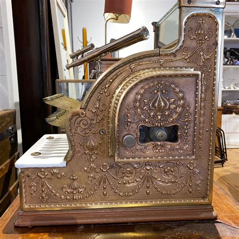 sold antique national cash register model   gold finish excellent working condition