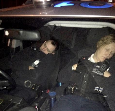 london pcs are caught on camera dozing off in illegally parked patrol car daily mail online