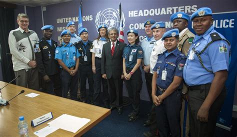 unmil police officers awarded  united nations medal united