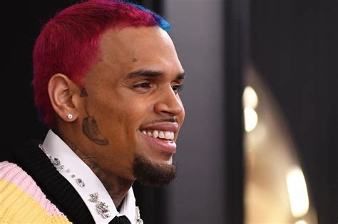 Chris Brown Shows Off Face Tattoo Of Air Jordan Sneaker