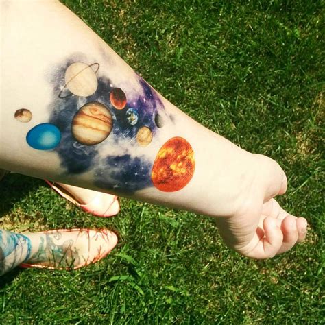 facinating solar system tattoo designs  origin  symbolism