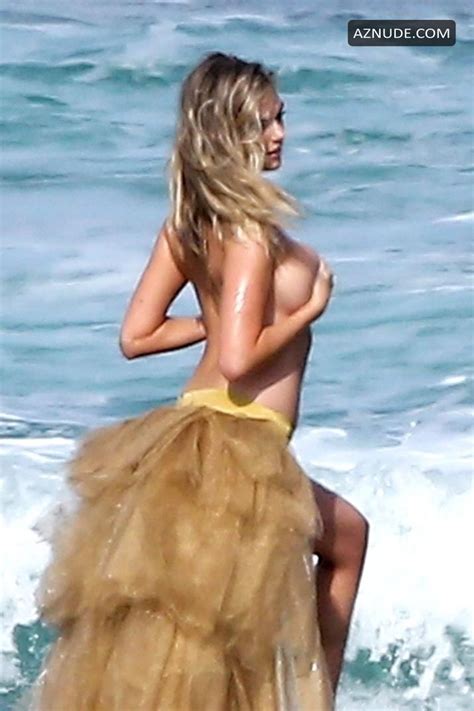 kate upton falls during topless photoshoot for sports illustrated 2018