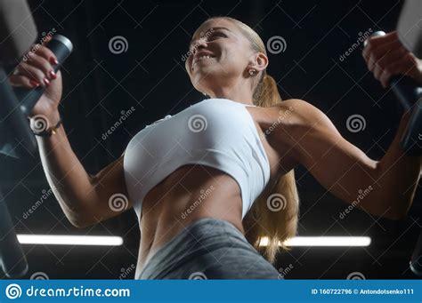 Pretty Caucasian Fitness Woman Pumping Up Muscles Workout Fitness And