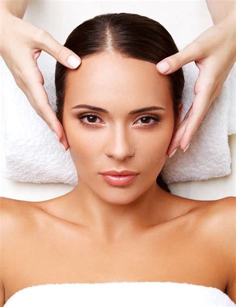 face massage close    young woman  spa treatment stock