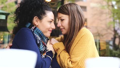 lesbian couple at a cafe stock footage video 100