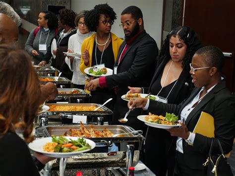 conference attendees serve  lunch   buffet friday