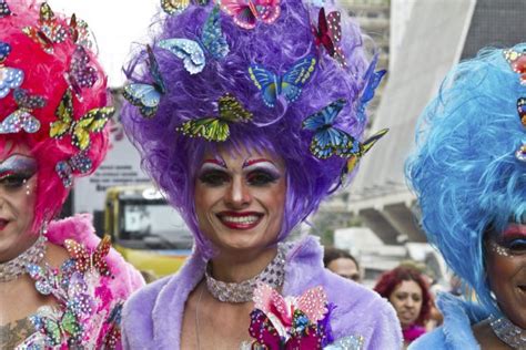 Vintage Crossdresser With A Big Wig At The Pride Parade