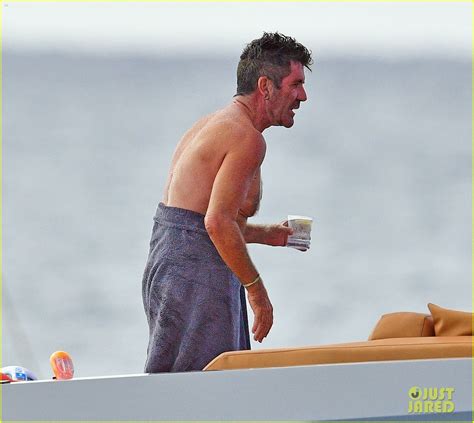Simon Cowell Puts Back Scars On Display After Scary Bike Accident